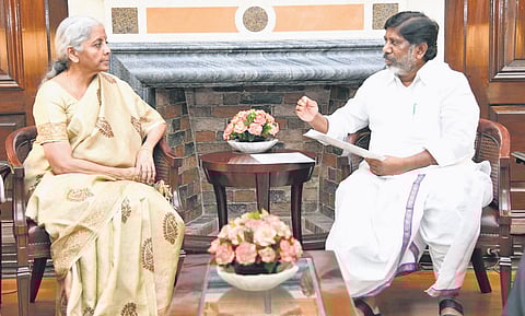 Deputy Chief Minister Mallu Bhatti Vikramarka makes a point to Union Finance Minister Nirmala Sitharaman in New Delhi on Thursday. 