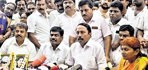 Gobichettipalayam MLA KA Sengottaiyan addressing the press in Erode.