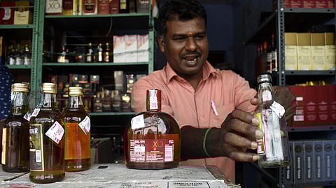 TASMAC outlets will charge rupees 10 more than the retail price of a liquor bottle and the amount will be returned to the customer when the bottle is handed back to the outlet.