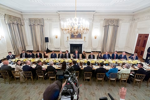 President Donald Trump points to a reporter to ask a question question during a dinner in the State Dinning Room of the White House, Thursday, Sept. 4, 2025, in Washington.