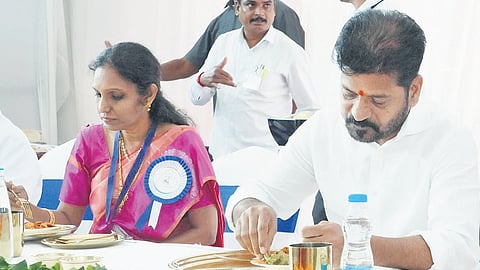 Chief Minister A Revanth Reddy joins teachers for a special community meal during Teachers’ Day celebrations at Shilpakala Vedika in Hyderabad.