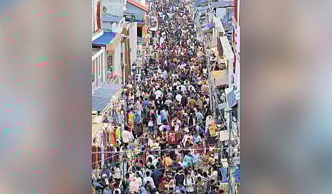 Market area in Pazhavangadi flooded with shoppers and pedestrians on Thursday 