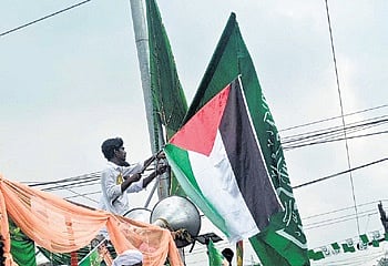 A youth waving Palestine flag