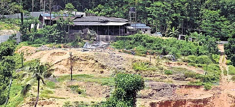 The area under the private pig farm where landfill waste has been dumped. Government authorities have examined the area and unearthed waste, including plastic, from the place.