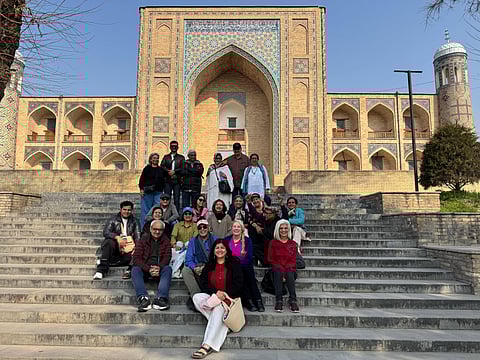 Shagufta Siddhi with her travellers at the Kukeldash Madrasah, Tashkent