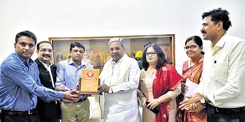 CM Siddaramaiah at the signing of the MoU between Karnataka Media Academy and Infosys.