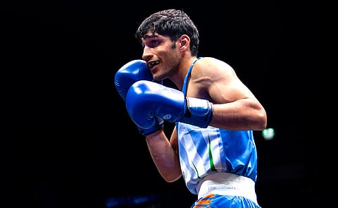 Abhinash Jamwal in action during his Round of 32 bout on Sunday