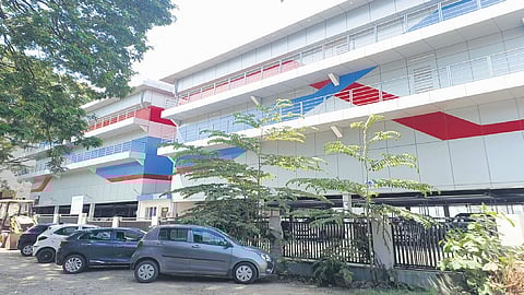 Vehicles parked outside the newly launched multi-level car parking facility near Palayam Market in Thiruvananthapuram.