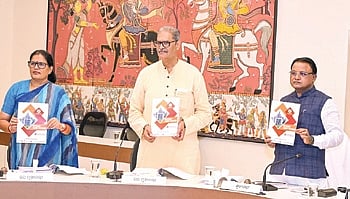 CM Mohan Charan Majhi releasing a  compilation of key decisions taken in last 25 cabinet meetings, on Wednesday