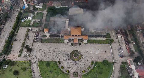 Protesters call for President Andry Rajoelina to step down in Antananarivo, Madagascar, Tuesday, Oct. 14, 2025. 