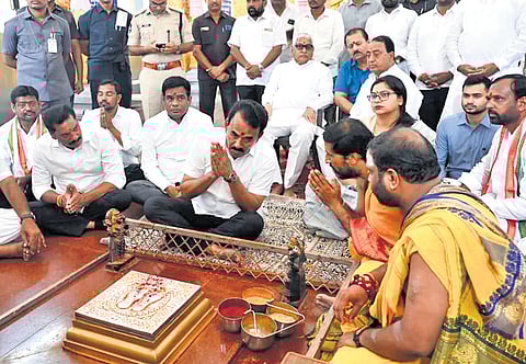 Excise Minister Jupally Krishna Rao offers prayers at the Basara temple on Wednesday.