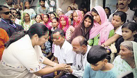 Chief Minister Rekha Gupta meets kin of victims in Shalimar Bagh on Tuesday.