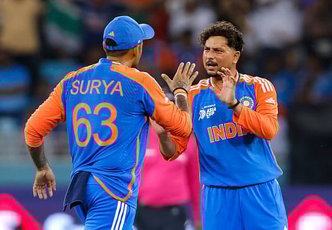 India's Kuldeep Yadav (R) had figures of 4/7 against UAE on Wednesday