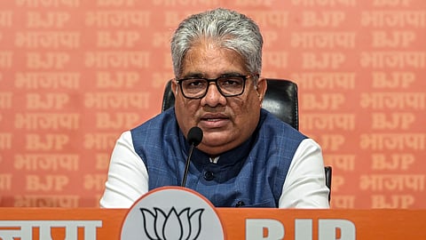 Union Minister Bhupender Yadav addresses a press conference at the BJP headquarters, in New Delhi on Thursday.