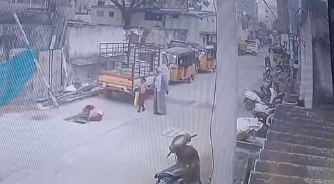 The incident, captured on CCTV cameras, shows the child slipping into the uncovered manhole and the alert woman rushing to pull her out.
