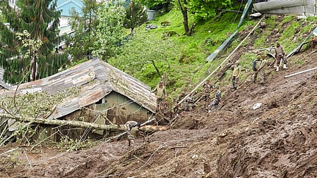 A senior police official confirmed that the landslide completely destroyed the residence.