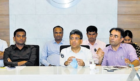 Additional Chief Secretary Tushar Girinath holds a meeting with officials of the five corporations on Friday 
