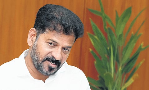 Telangana CM Revanth Reddy for permanent ghats at temples on banks of Godavari