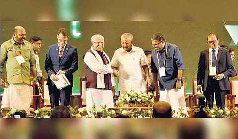Chief Minister Pinarayi Vijayan greets Union Minister Manohar Lal Khattar at the Kerala Urban Conclave 2025 in Kochi. Minister P Rajeeve, Lucas Martinez Mayor, executive council member of South Africa Department of Public Sector Infrastructure Development, Minister M B Rajesh, and Sri Lankan Minister Anura Karunathilaka are also seen.