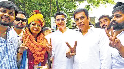 AICC general secretary Sachin Pilot with DPCC president Devender Yadav campaigning at Miranda House college on Monday.