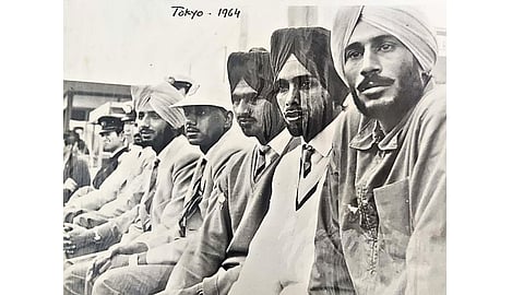 (Right) Prithipal Singh watching a hockey game at 1964 Tokyo Olympics game