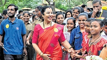 Actor Tara Anuradha with volunteers during STEM awareness walkathon at Bal Bhavan in Bengaluru 