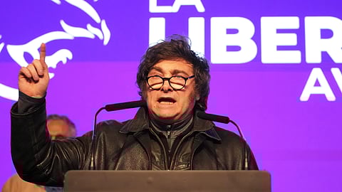 Argentina's President Javier Milei talks after legislative provincial election polls closed in La Plata, Argentina, Sunday, Sept. 7, 2025.