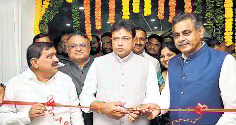 IT and Industries Minister D Sridhar Babu, flanked by MP Konda Vishweshwar Reddy, inaugurates the Passport Seva Kendra in Raidurgam, Hyderabad, on Tuesday