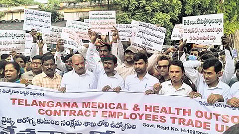 To demand the immediate release of their pending wages, a massive protest was organised on Tuesday in front of government hospitals across the state.