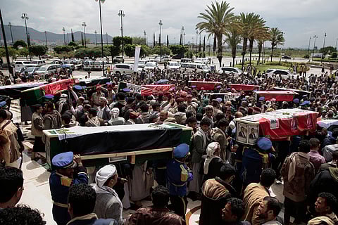Yemenis cary the coffins of 31 local journalists reportedly killed in Israeli airstrikes last week, during their funeral in Sanaa, Yemen, Tuesday, Sept. 16, 2025.