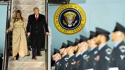 US President Donald Trump and First Lady Melania Trump exit Air Force One as they arrive at Stansted Airport near London, Tuesday, Sept. 16, 2025.