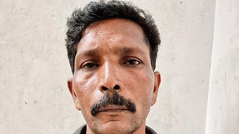 Mahesh, the man who duped a woman online posing as a police officer.