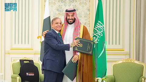 Pakistani Prime Minister Shehbaz Sharif, left, embracing Saudi Arabia's Crown Prince Mohammed bin Salman after signing a joint defense pact in Riyadh, Saudi Arabia, Wednesday, Sept. 17, 2025.