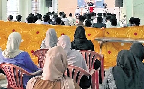 This picture of male and female students seggregated at a function misconstrued as held at Cusat landed the university in trouble