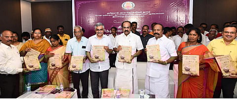 Thangam Thennarasu along with Minister KR Periakaruppan releases books during an event in Sivaganga district on Saturday.