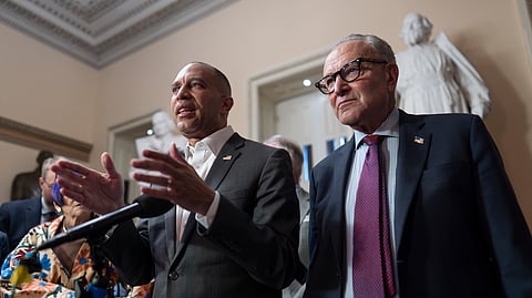 House Democratic Leader Hakeem Jeffries, left, and Senate Democratic Leader Chuck Schumer tell reporters that they are united as the Sept. 30 funding deadline approaches, at the Capitol in Washington, Thursday, Sept. 11, 2025.