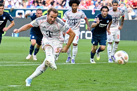 Bayern's Harry Kane celebrates after scoring his side's second goal during the German soccer cup match between Cologne and FC Bayern Munich in Cologne, Wednesday, Oct. 29, 2025.