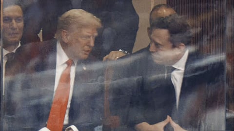 Donald Trump sat side-by-side with billionaire Elon Musk at a memorial event for right-wing leader Charlie Kirk on Sunday.