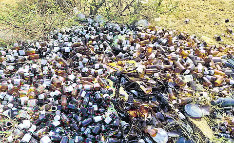 Medical waste dumped on grassland in Coimbatore