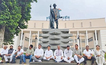 The Congress MLAs protested the decision of the Speaker and staged a dharna near the Mahatma Gandhi statue on the Assembly premises.