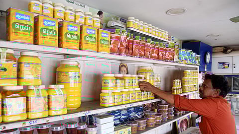 Ghee and other dairy products stacked at an Aavin outlet.