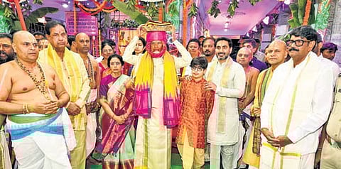Chief Minister N Chandrababu Naidu, accompanied by his family members, offers silk robes to Lord Venkateswara at Tirumala on Wednesday.