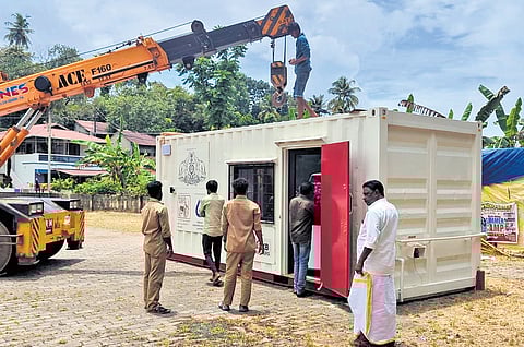 The portable ABC unit being placed at the Nedumangad parking yard using a crane on Wednesday.