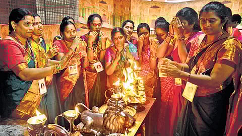 Devotees take Harati at the Utsav idols of Goddess Kanaka Durga on Day 2 of Dasara festivities.