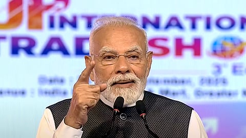 Prime Minister Narendra Modi addresses the gathering during the inauguration of Uttar Pradesh International Trade Show 2025, in Greater Noida, Gautam Buddha Nagar district.