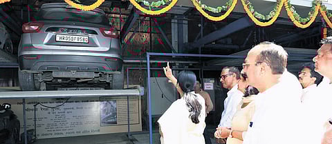 Delhi Chief Minister Rekha Gupta Inaugurates an automated multilevel puzzle car parking facility at Punjabi Bagh cremation ground in Delhi.