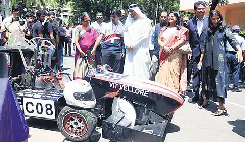 Guests observing exhibits at the techno-management festival of VIT University on Friday