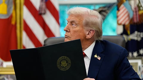 US President Donald Trump listens during a meeting at the Oval Office of the White House, Thursday, Sept. 25, 2025, in Washington.