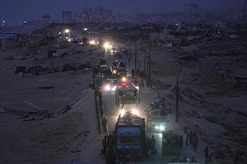 Displaced Palestinians flee northern Gaza, by vehicle and on foot, carrying their belongings along the coastal road near Wadi Gaza, Friday, September 26, 2025.