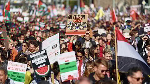 People protest against Israel during a mass demonstration called "All Eyes on Gaza" in support of Palestinians in Berlin, Germany, Saturday, Sept. 27, 2025.